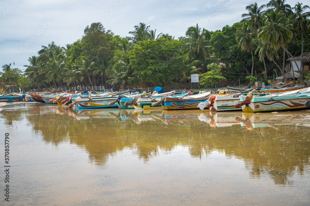 colorful fishing boats on the beach, Arugam Bay, Sri Lanka