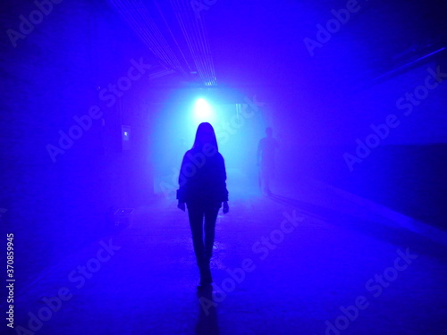 Silhouette of girl in lights