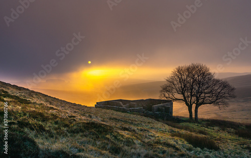 Sunrise of Top Withens or Top Withins, this farmhouse has been associated with `Wuthering Heights'. photo