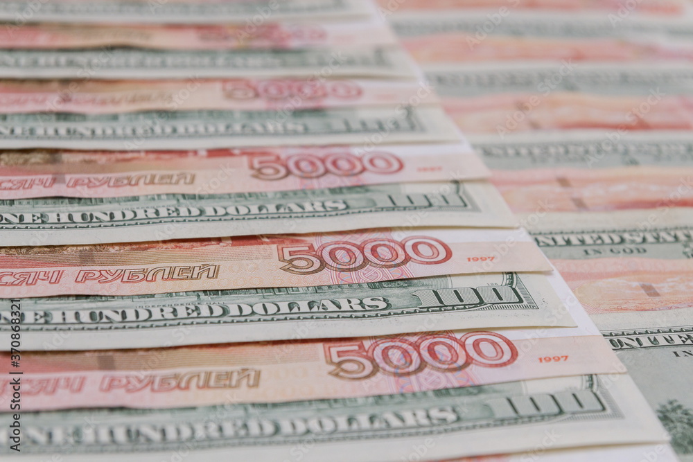 A large number of American hundred dollar bills and Russian five thousand dollar bills A large number of American hundred dollar bills and Russian five thousand dollar bills