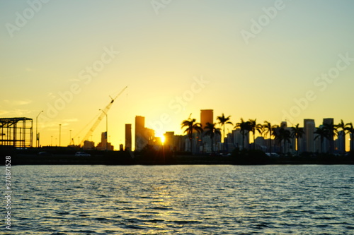 Miami downtown skyscrapers and beach at sun set