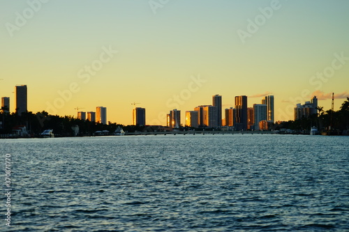 Miami downtown skyscrapers and beach at sun set © Feng
