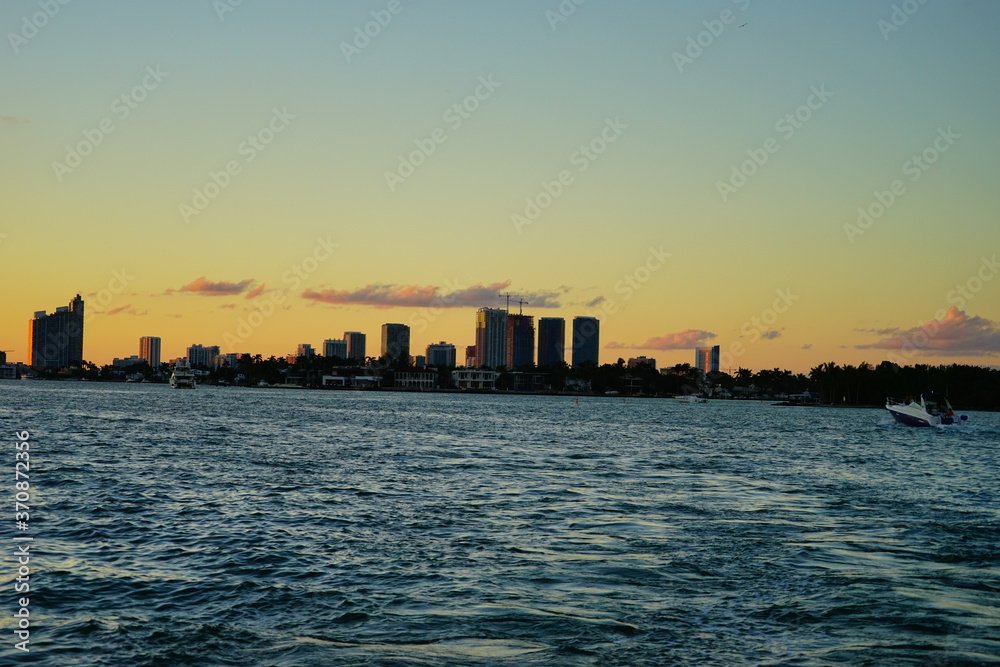 Miami downtown skyscrapers and beach at sun set
Miami downtown skyscrapers and beach at sun set