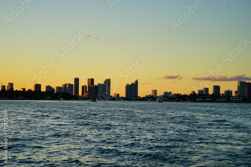 Miami downtown and beach at sun set  © Feng