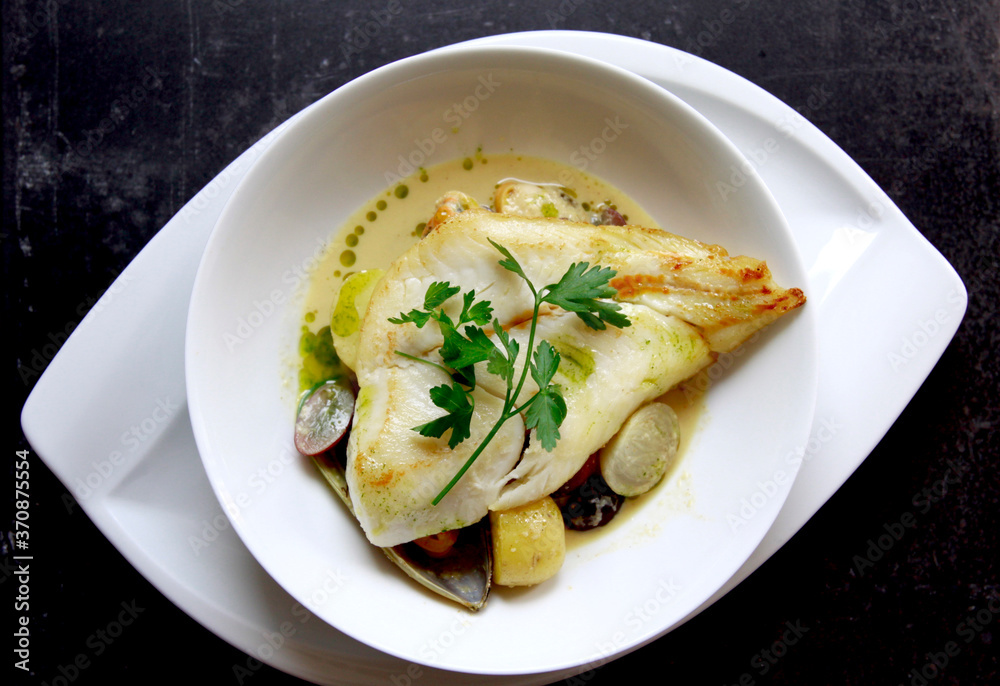 Hake & Mussels on a curry veloute