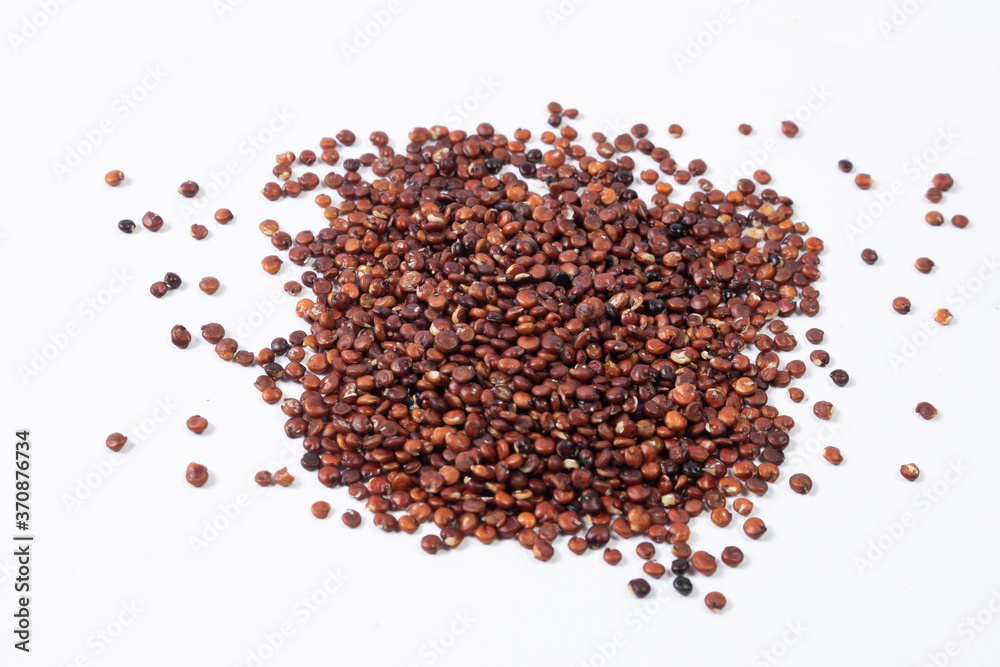 Pile of healthy south american grain red Quinoa on white background. Pile of healthy south american grain red Quinoa on white background.