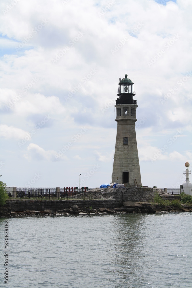 lighthouse on the shore of the river