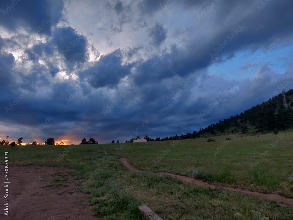 Fototapeta premium Clouds on the trails at sunset