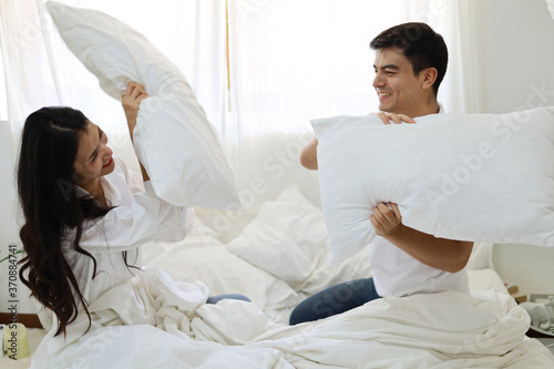 happiness young couple lover resting and relaxation on bedroom.