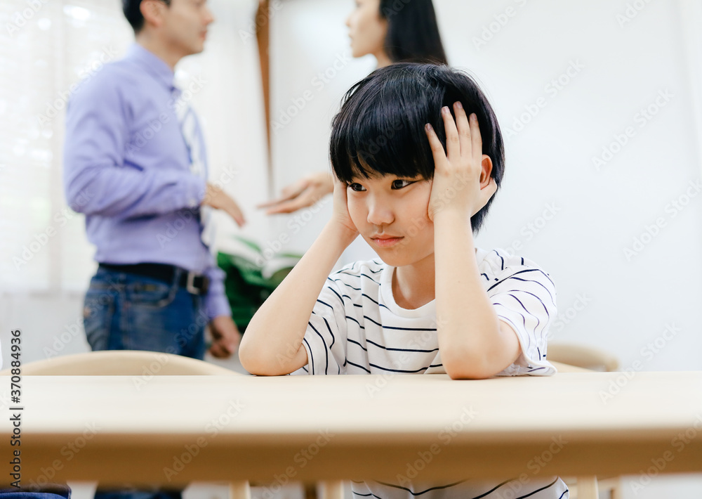 Family problems concept, father and mother quarreling in the house so causing children to feel bad. Family problems concept, father and mother quarreling in the house so causing children to feel bad.