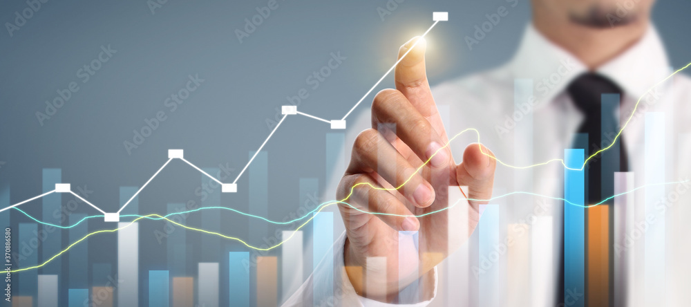Businessman plan graph growth increase of chart positive indicators in his business Businessman plan graph growth increase of chart positive indicators in his business