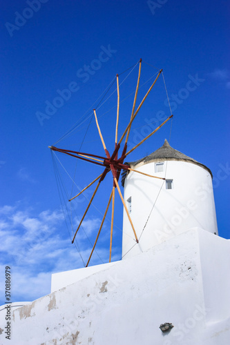 Windmill house in Oia with blue sky, Santorini