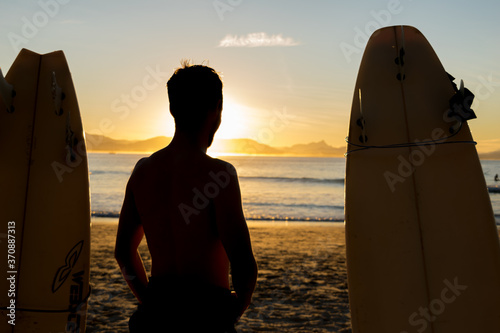surfer on the beach, and sunset background, view from byron bay, Australia 2018 © Adrian Martinez ph