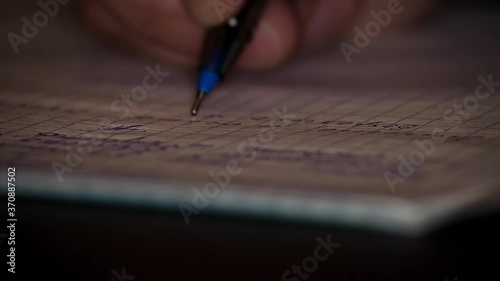 Signature on Contract by Pen in Male Hand
