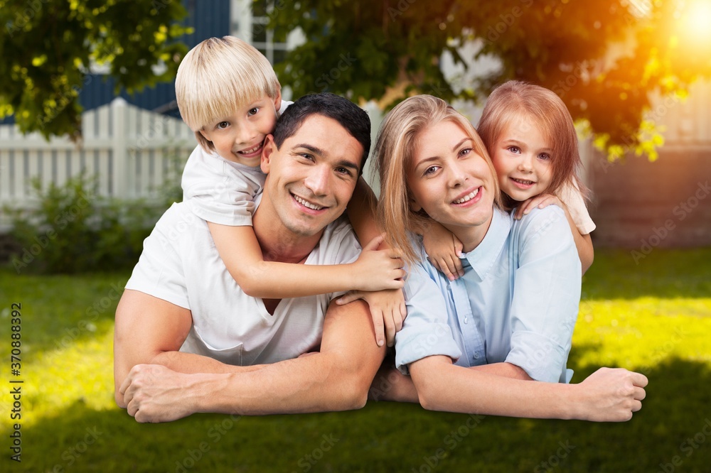 Beautiful smiling lovely family playing outdoor