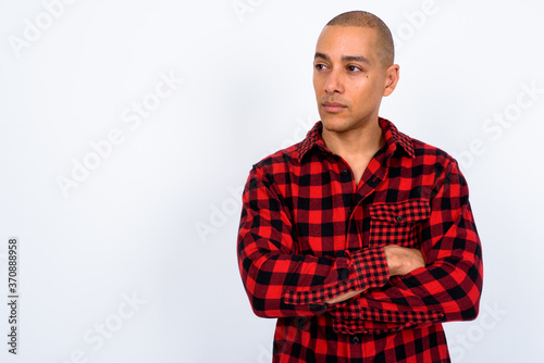 Portrait of handsome multi ethnic bald hipster man
