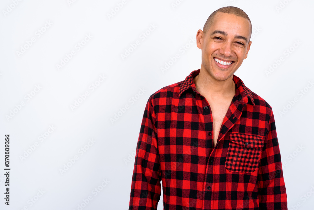 Portrait of happy handsome multi ethnic bald hipster man Portrait of happy handsome multi ethnic bald hipster man