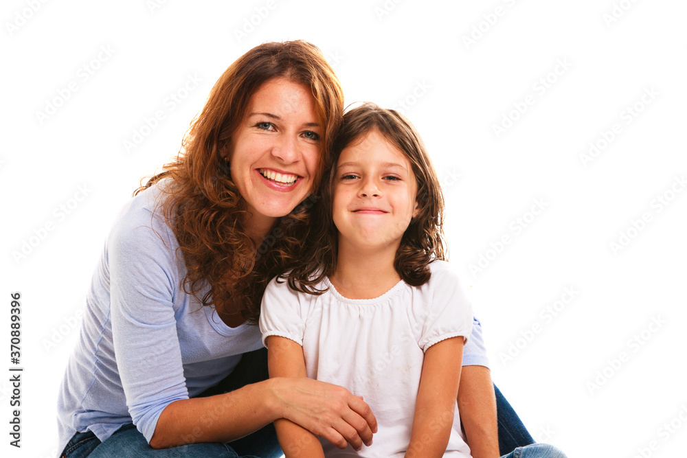 Pretty young mother and daughter portrait on a white background Pretty young mother and daughter portrait on a white background