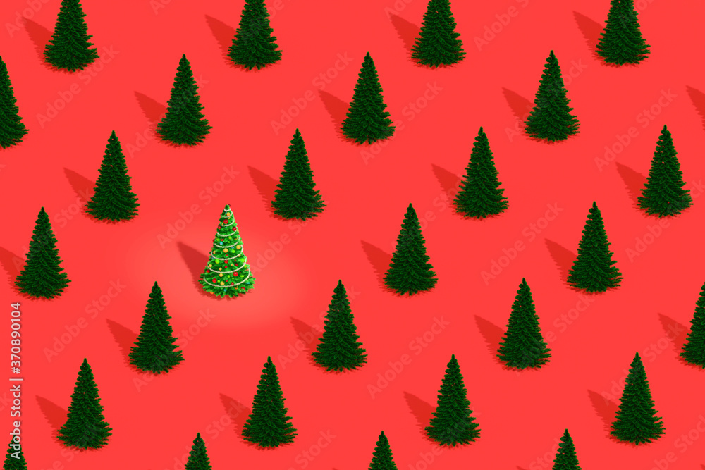 Christmas tree decorated with Christmas toys among number of ordinary fir trees. The concept of uniqueness. Pattern from Christmas trees on red