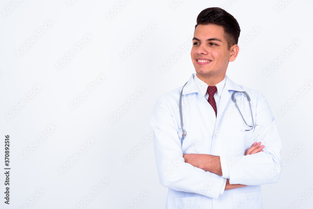 Portrait of happy young handsome multi ethnic man doctor Portrait of happy young handsome multi ethnic man doctor