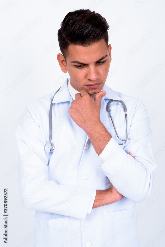 Portrait of young handsome multi ethnic man doctor Portrait of young handsome multi ethnic man doctor