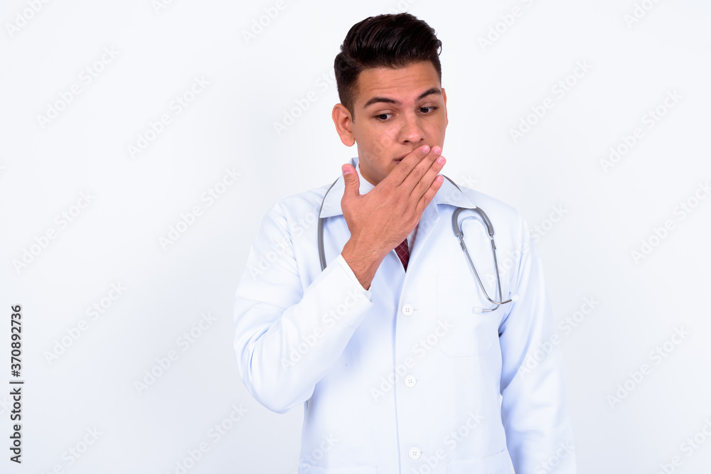 Portrait of young handsome multi ethnic man doctor Portrait of young handsome multi ethnic man doctor
