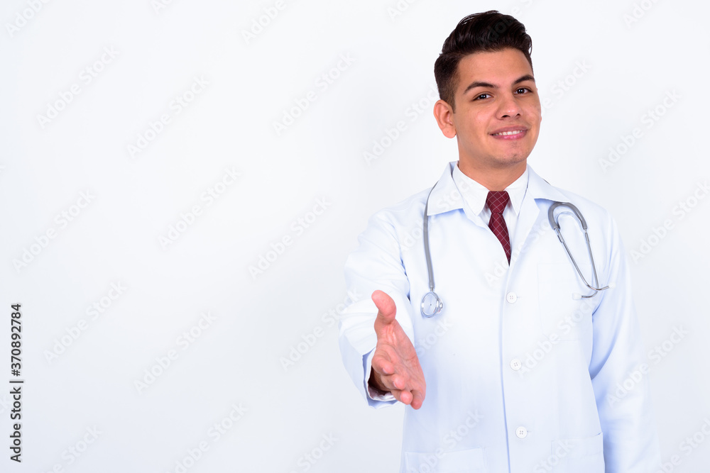 Portrait of happy young handsome multi ethnic man doctor Portrait of happy young handsome multi ethnic man doctor