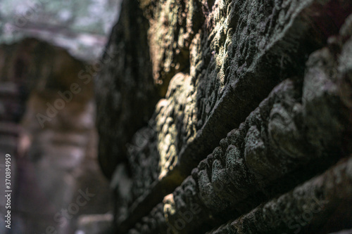 Angkor Wat, Siem Reap, Cambodia. March, 10, 2020: Hand-carved walls in Buddhist temple of Angkor Wat.