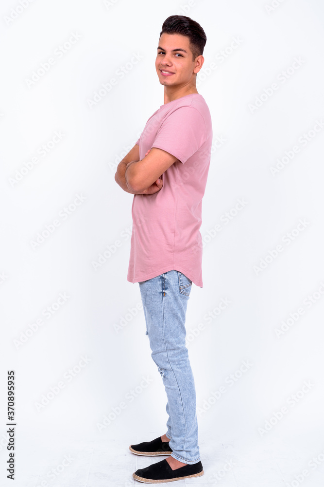 Portrait of happy young handsome multi ethnic man