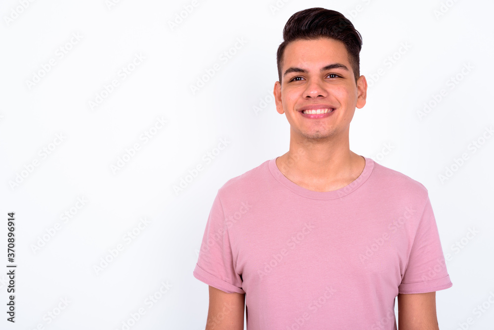 Portrait of happy young handsome multi ethnic man