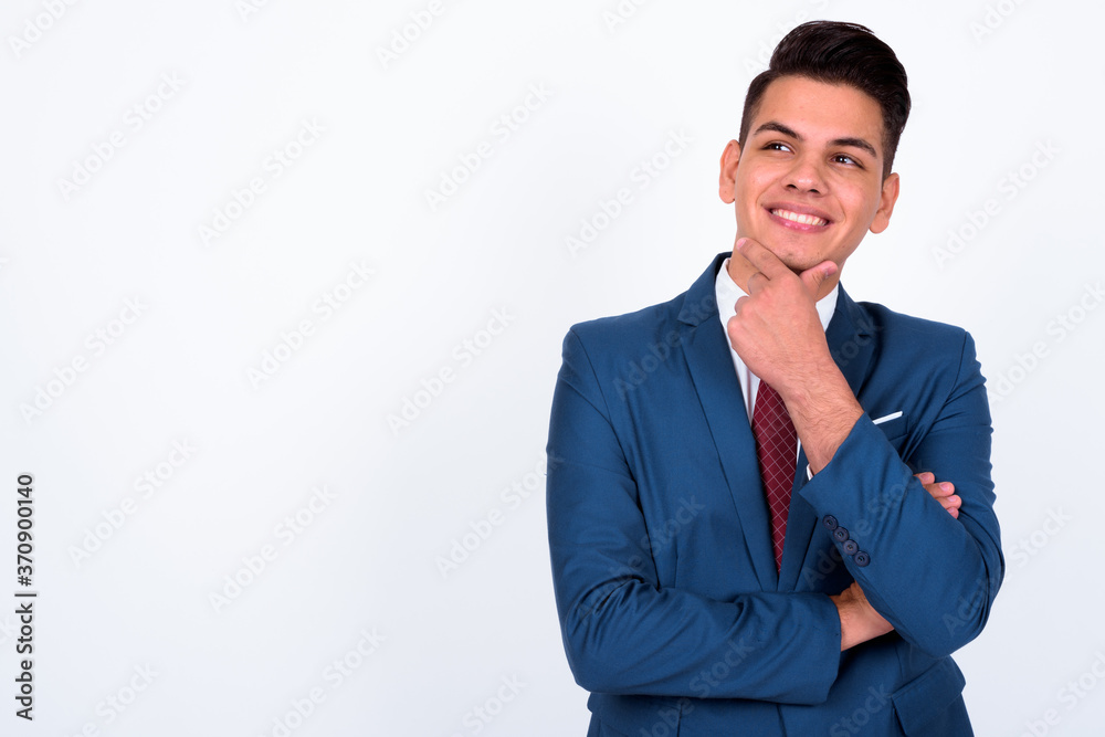 Portrait of happy young handsome multi ethnic businessman in suit Portrait of happy young handsome multi ethnic businessman in suit