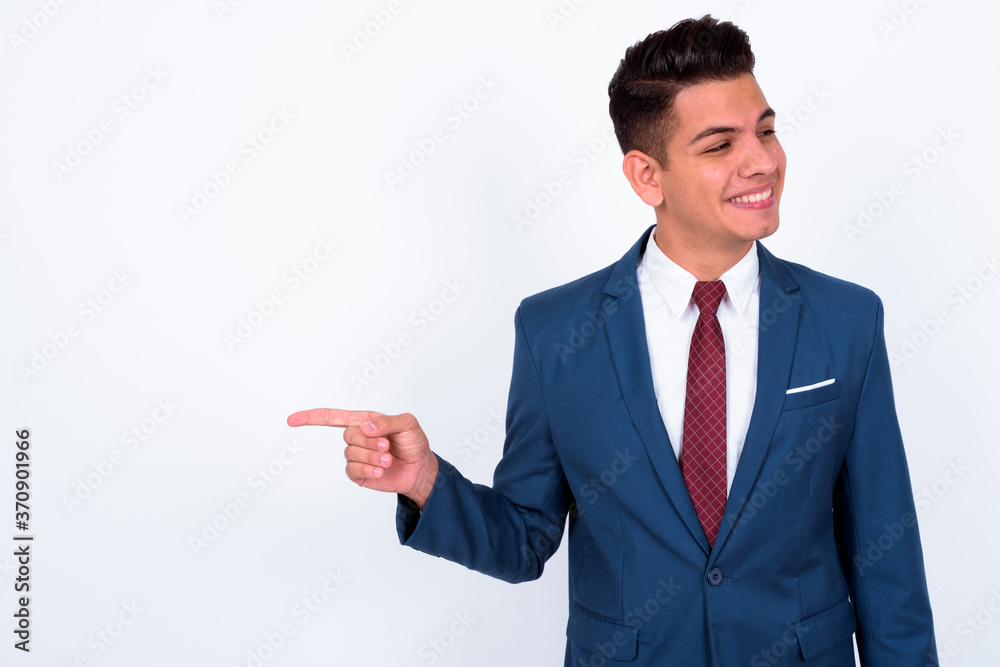 Portrait of happy young handsome multi ethnic businessman in suit Portrait of happy young handsome multi ethnic businessman in suit