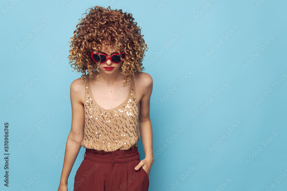 Emotional model hand gestures on an isolated blue background Emotional model hand gestures on an isolated blue background