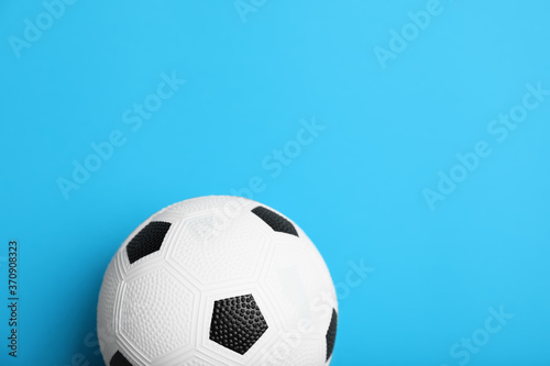 Soccer ball on color background