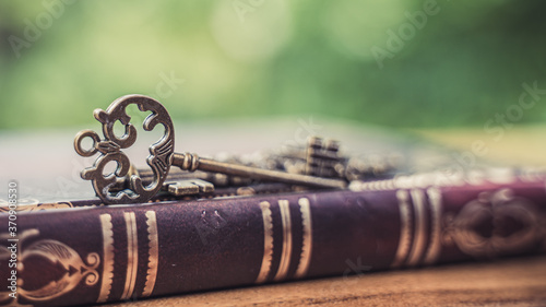 Old Antique Key On Book 