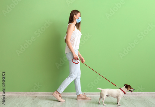 Young woman in protective m...