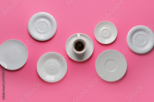 Coffee cup with saucer surr...