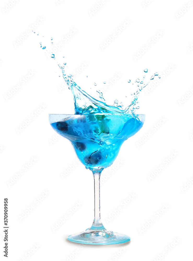 Glass of tasty blue mojito cocktail with splashes on white background Glass of tasty blue mojito cocktail with splashes on white background