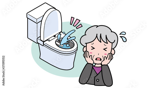 洋式トイレのウォッシュレットから水が止まらず困っているおばあさん