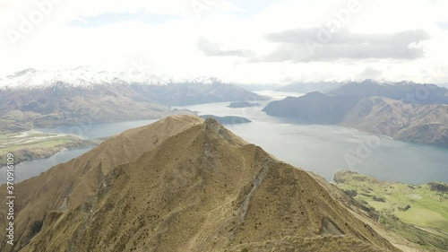 Drone fly over couple Roy's Peak New Zealand