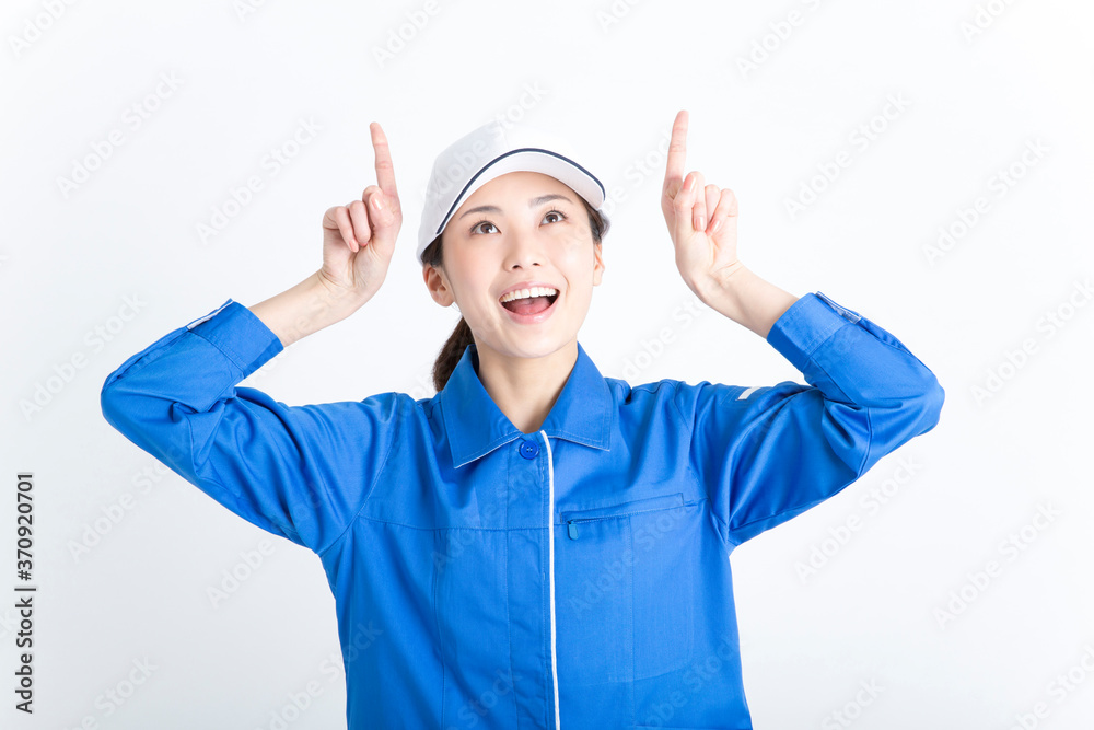 指さしをする清掃員 指さしをする清掃員