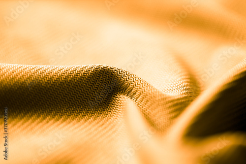 Golden fabric as an abstract background.