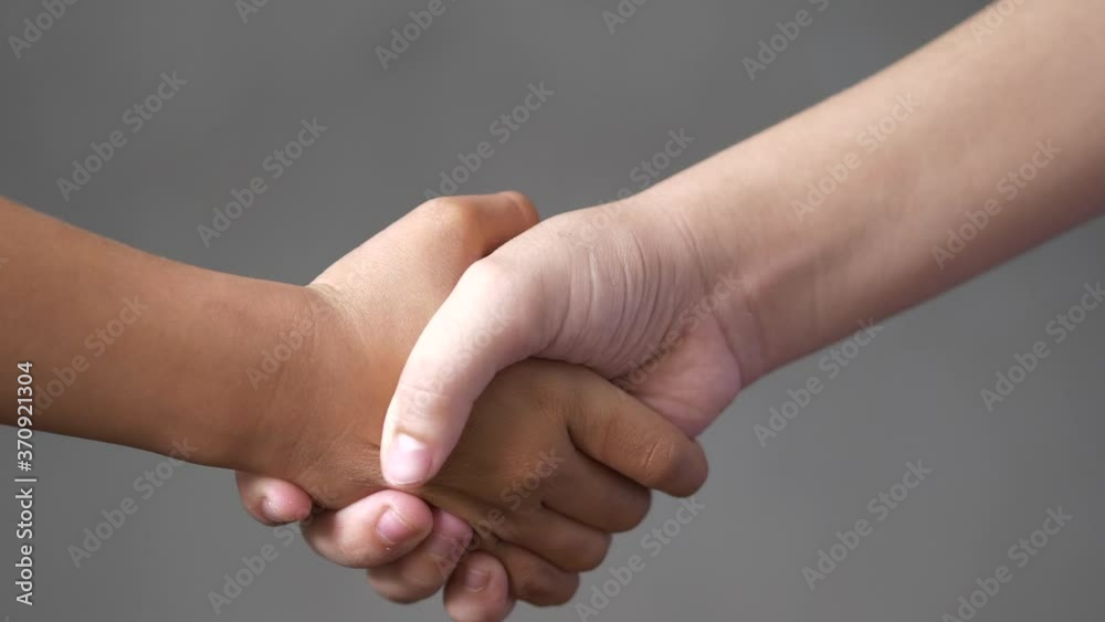handshake between two Child , education concept handshake between two Child , education concept