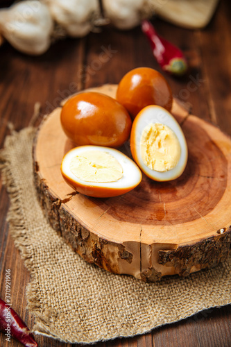 Marinated eggs on the wooden board