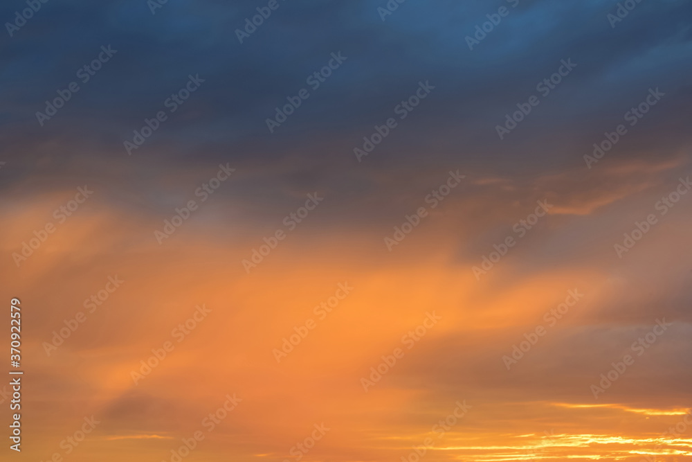 Colorful fiery sunset. Natural scenery, beautiful sky. Copy space.