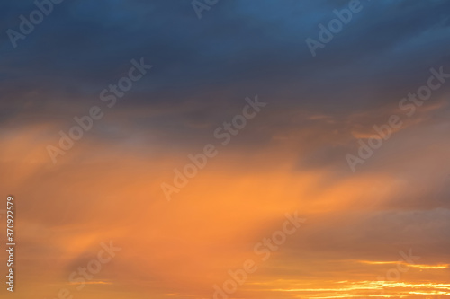 Colorful fiery sunset. Natural scenery, beautiful sky. Copy space. © Marina_Nov