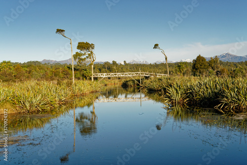 West Coast Wilderness Trail over bridge, Lake Mahinapua, Hokitika, west coast, sought island, New Zealand. photo