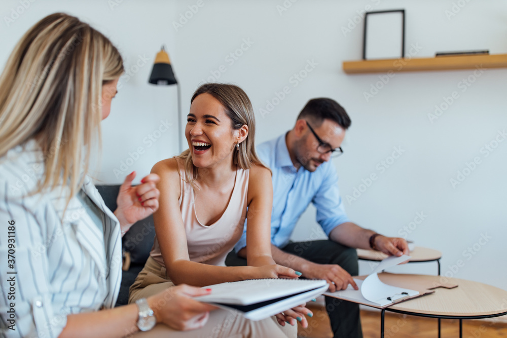 Two businesswomen having fun while working, portrait. Two businesswomen having fun while working, portrait.