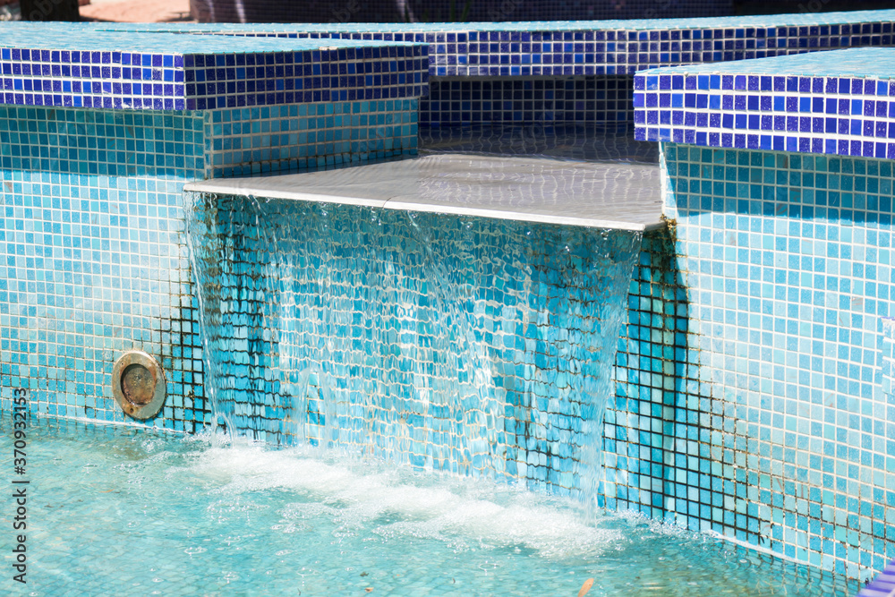 Blue fountain in the form of a waterfall