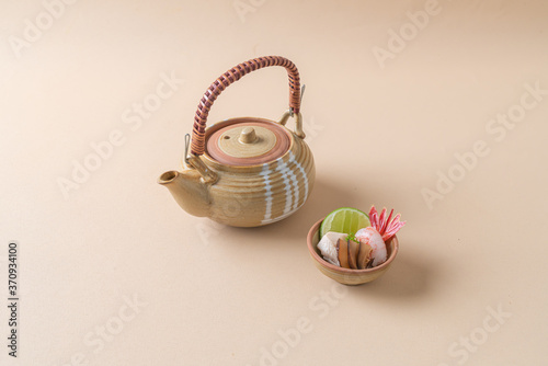 dobin mushi - steamed matsutake mushroom and pike conger with Japanese broth in an earthenware teapot. photo